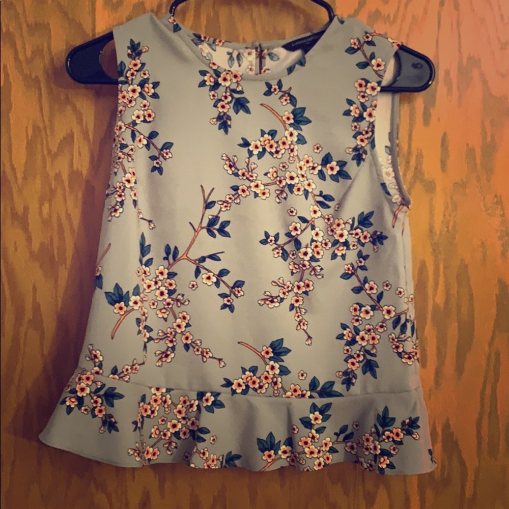 Beautiful floral pattern sleeveless blouse